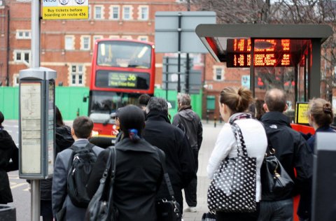 Passengers waiting at bus stop
