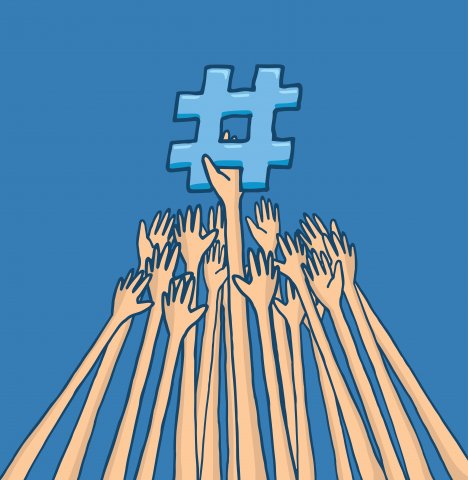 Hands reaching for a hashtag Hands reaching for a hashtag
