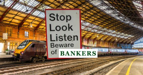 Stop, look, listen. Beware of bankers Photo of train station and sign: Stop, look, listen. Beware of bankers
