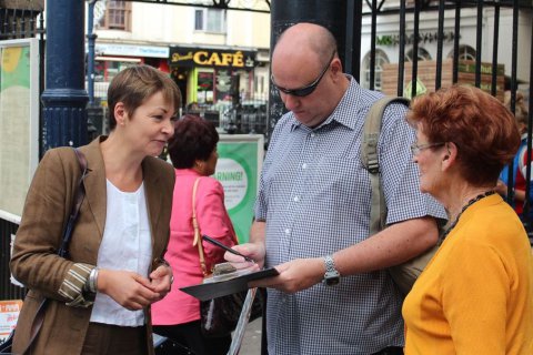 Photo of Caroline Lucas at Brighton station
