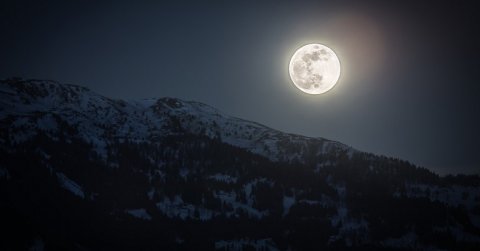 A night sky with the moon