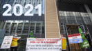 Image of protesters with Serco banners