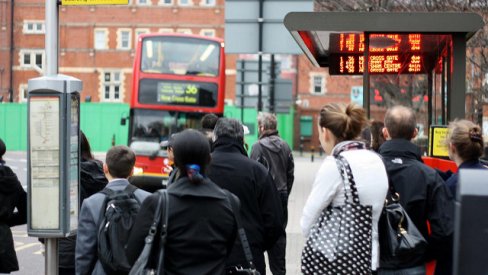 Passengers waiting at bus stop
