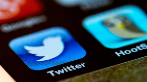 Picture of a twitter icon on a smartphone