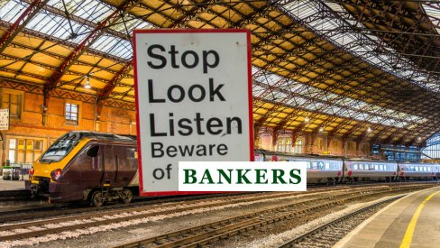 Photo of train station and sign: Stop, look, listen. Beware of bankers
