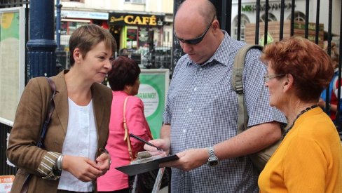 Photo of Caroline Lucas at Brighton station
