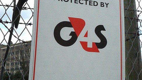 Photo of G4S sign on fence